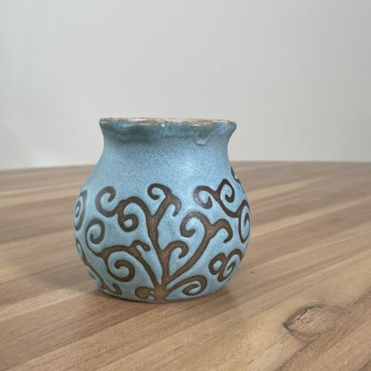 Small turquoise vase, masked pattern