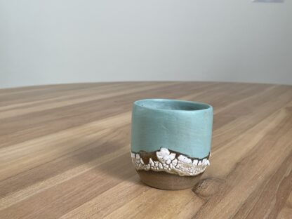 Light teal tumbler with a cloud-like belt - Image 2