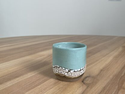 Light teal tumbler with a cloud-like belt - Image 5