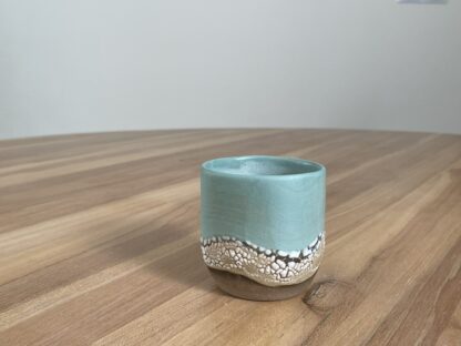 Light teal tumbler with a cloud-like belt - Image 6