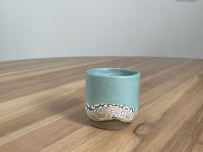 Light teal tumbler with a cloud-like belt - Image 7