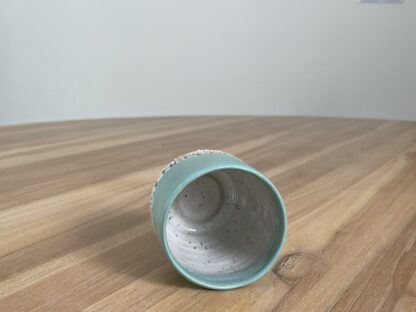 Light teal tumbler with a cloud-like belt - Image 8