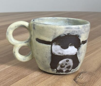 Upside-down panda mug, yellow