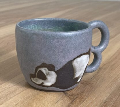 No-energy panda mug, pinkish-green