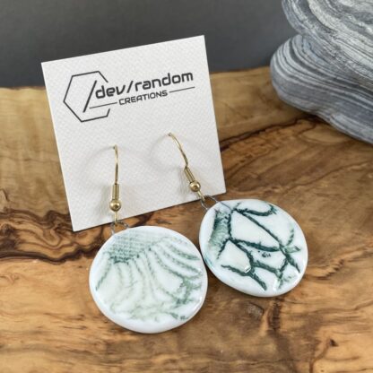 Green round napkin earrings