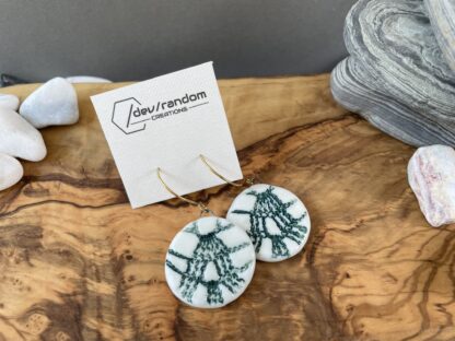 Green round napkin earrings