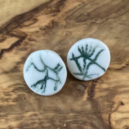 Green round napkin sticks earrings