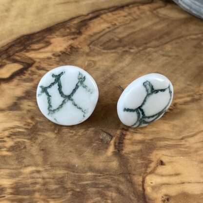 Green round napkin sticks earrings