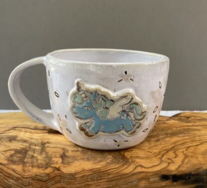 Light blue sparkly unicorn mug "Everything is temporary"