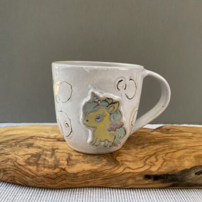 Light blue sparkly unicorn mug "To jest, kurwa, dramat"