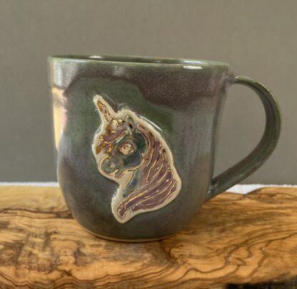 Pinkish-green sparkly unicorn mug "Are you fascinated by slowly flowing water?"