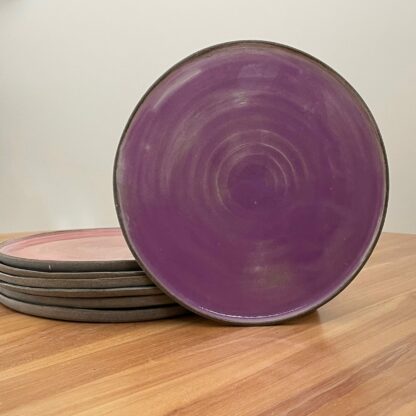 Purple dinner plate with subtle spiral