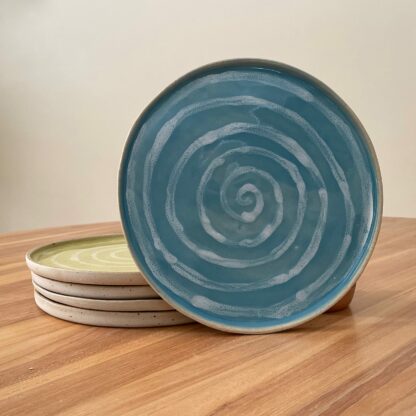 Blue dinner plate with white spiral