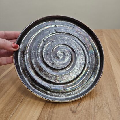 Cosmic plate with spiral