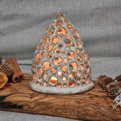 Openwork cone-shaped luminary