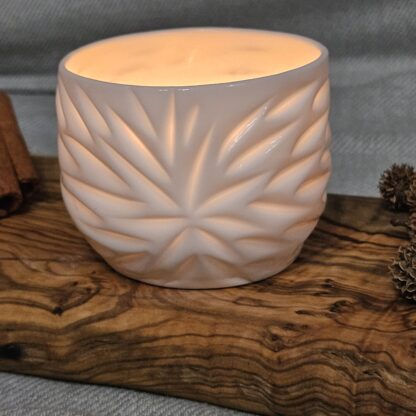 Porcelain luminary with carvings