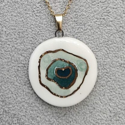 Round inception necklace with gold