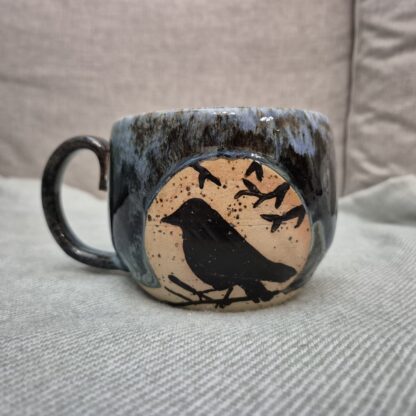 Night sky mug with a jackdaw