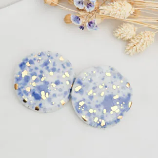 Round porcelain stick-earrings - blue splash speckles with gold