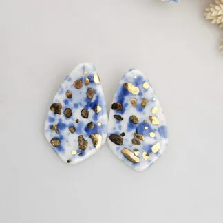 Porcelain stick-earrings - blue splash speckles with gold