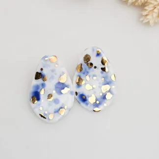 Porcelain stick-earrings - blue splash speckles with gold