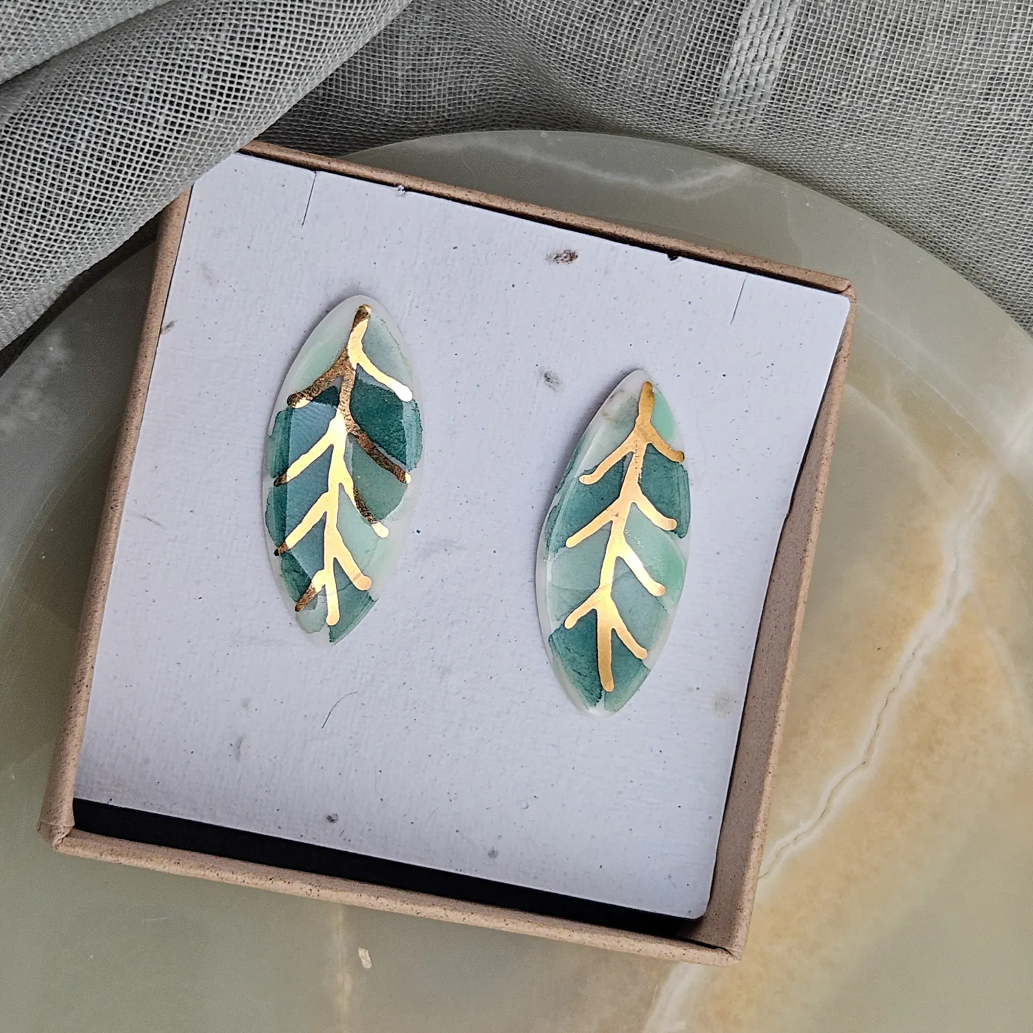 Porcelain stick-earrings - green leaf with gold - Image 5