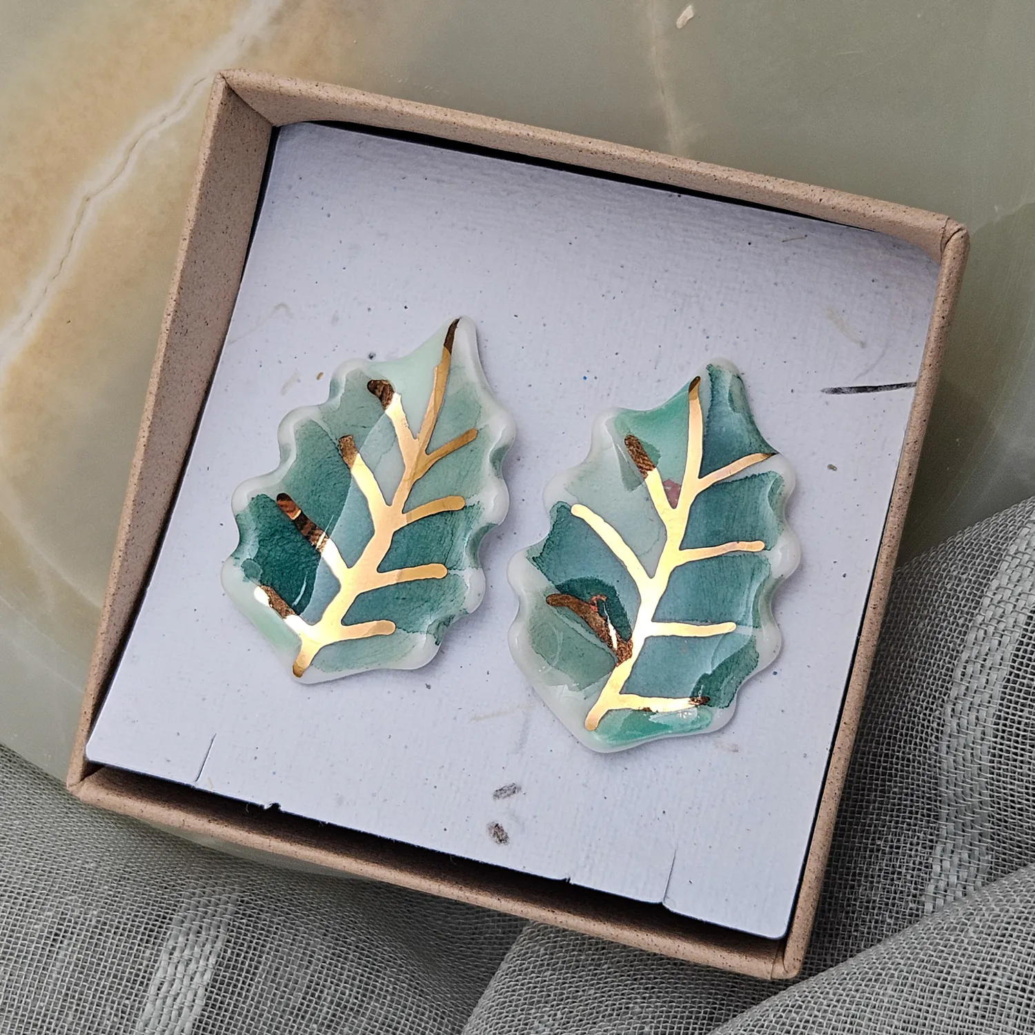 Porcelain stick-earrings - green leaf with gold - Image 5