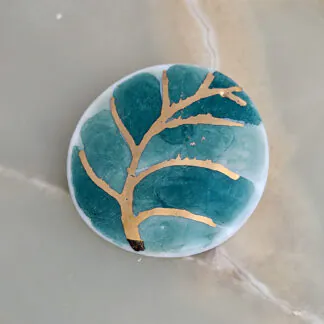 Porcelain brooch - green leaf with gold