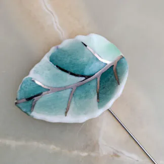 Fine ceramic fine ceramic porcelain brooch - green leaf with silver accents (white gold)