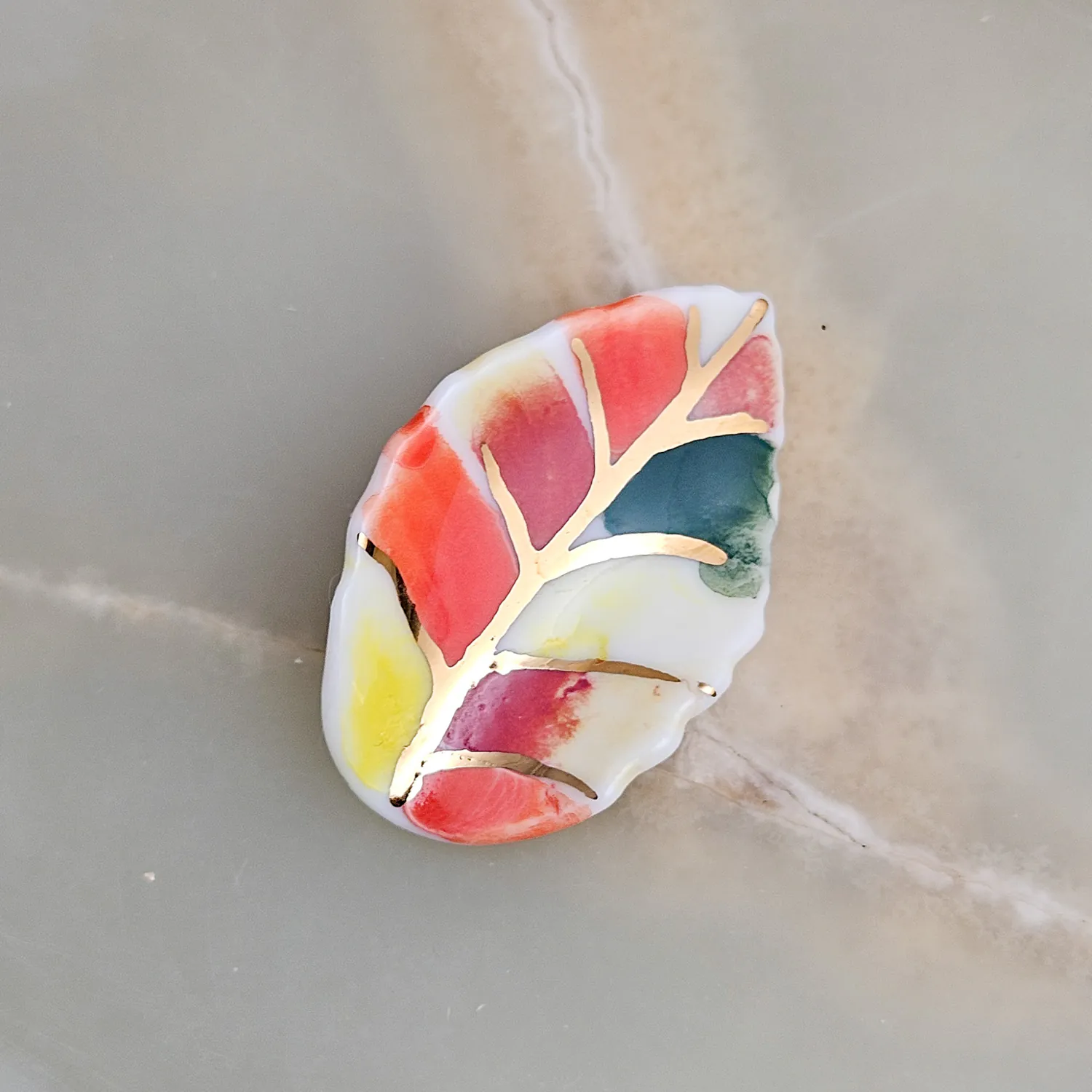 Porcelain brooch - autumn leaf with gold