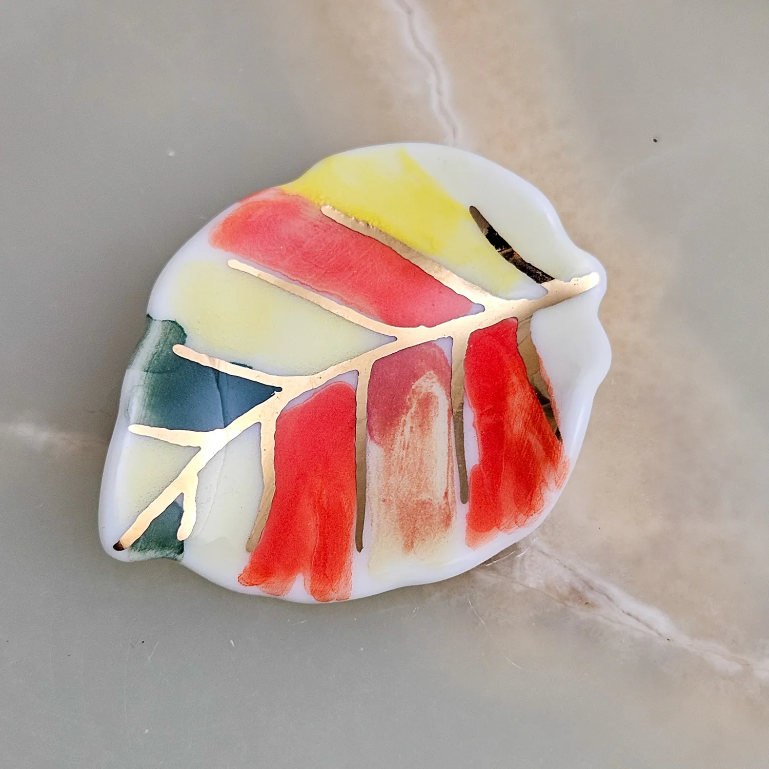 Porcelain brooch - autumn leaf with gold