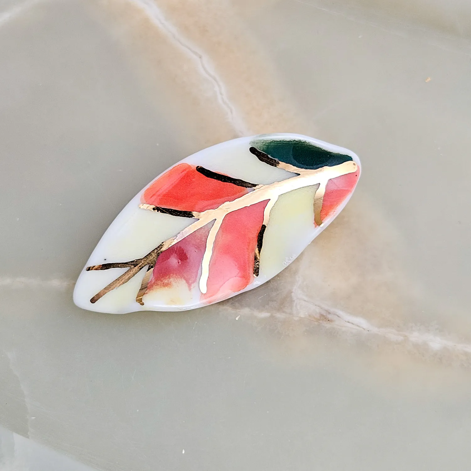 Porcelain brooch - autumn leaf with gold