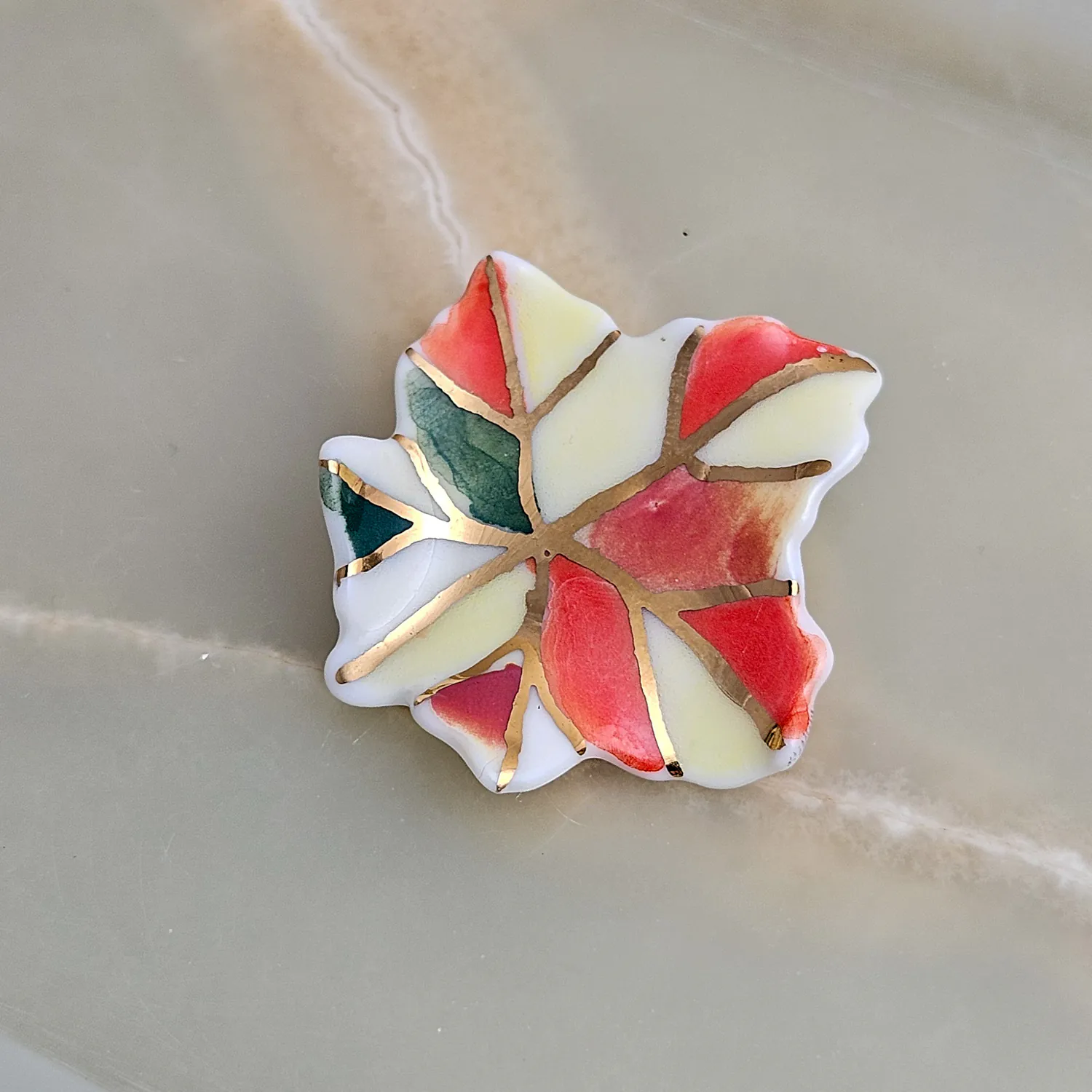 Porcelain brooch - autumn leaf with gold