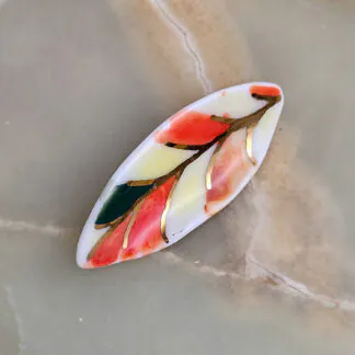 Porcelain brooch - autumn leaf with gold