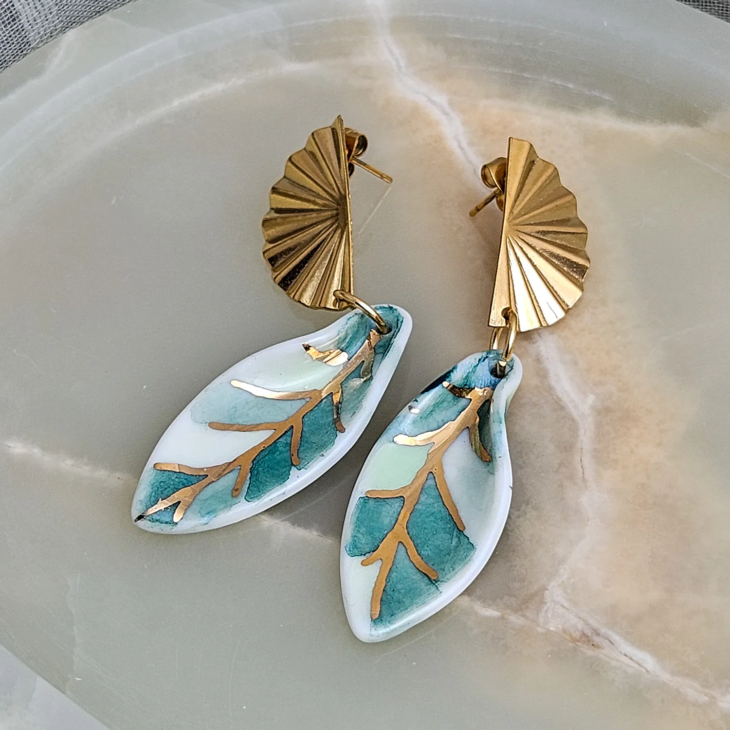 Hanging porcelain earrings - green leaf with gold