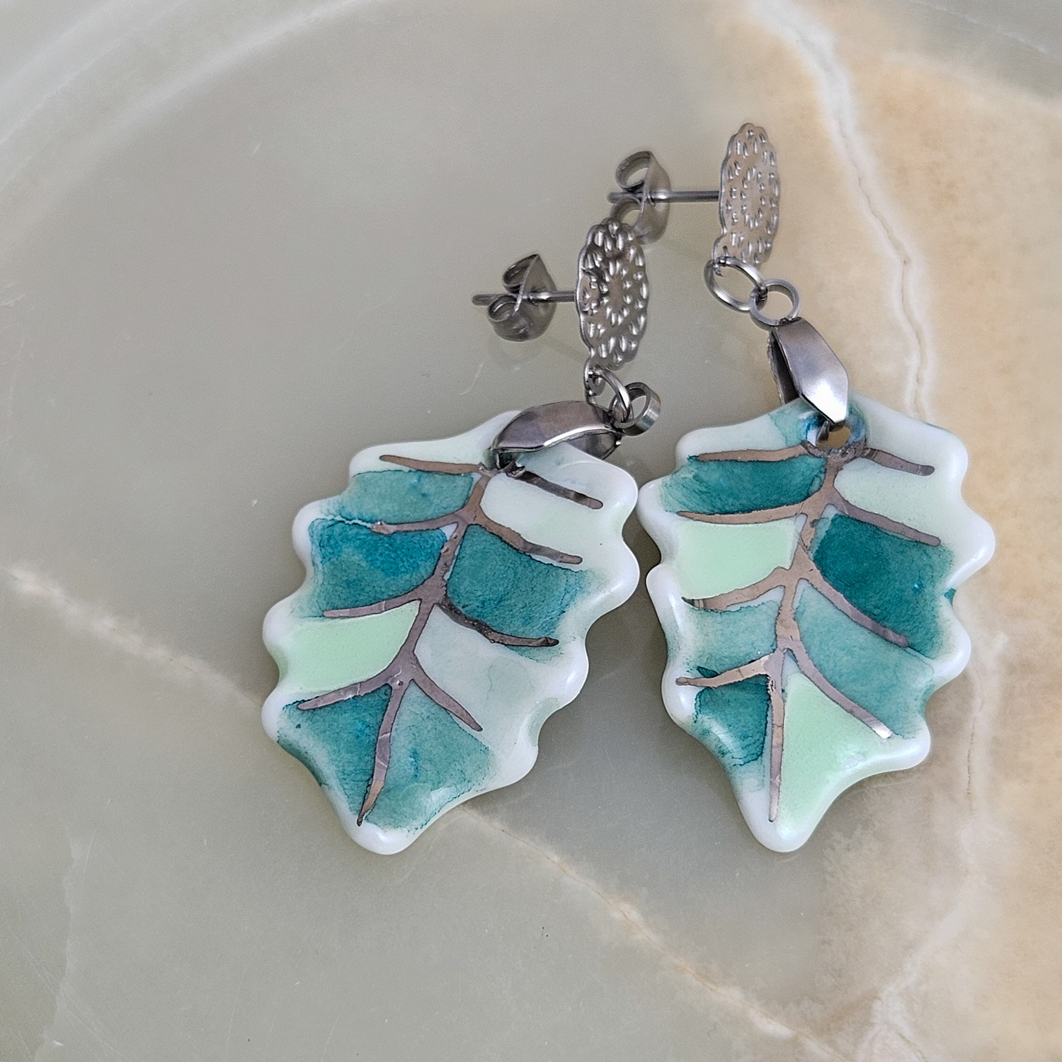 Dangle fine ceramic porcelain designer earrings - green leaf with silver accents (white gold)