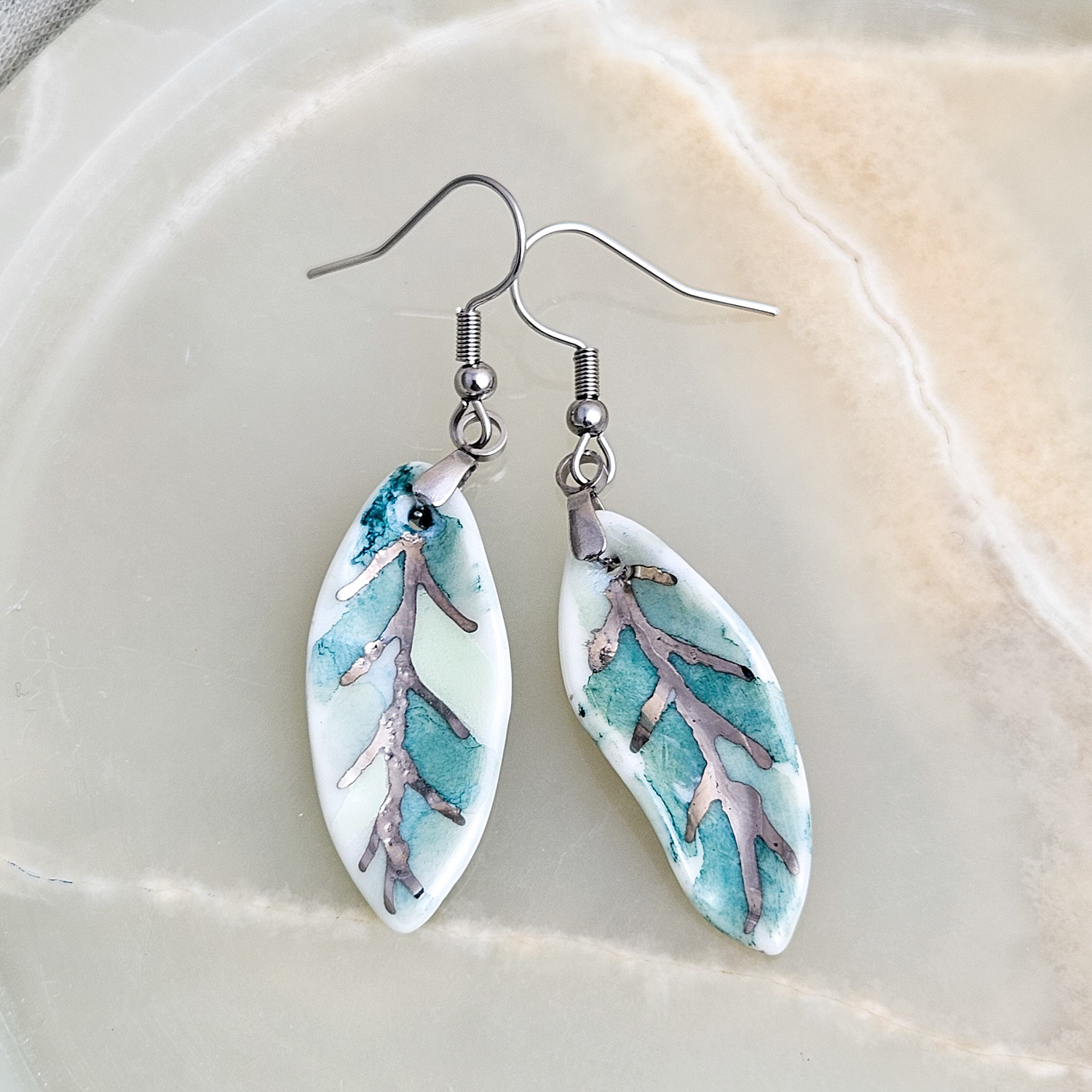 Dangle fine ceramic porcelain designer earrings - green leaf with silver accents (white gold)