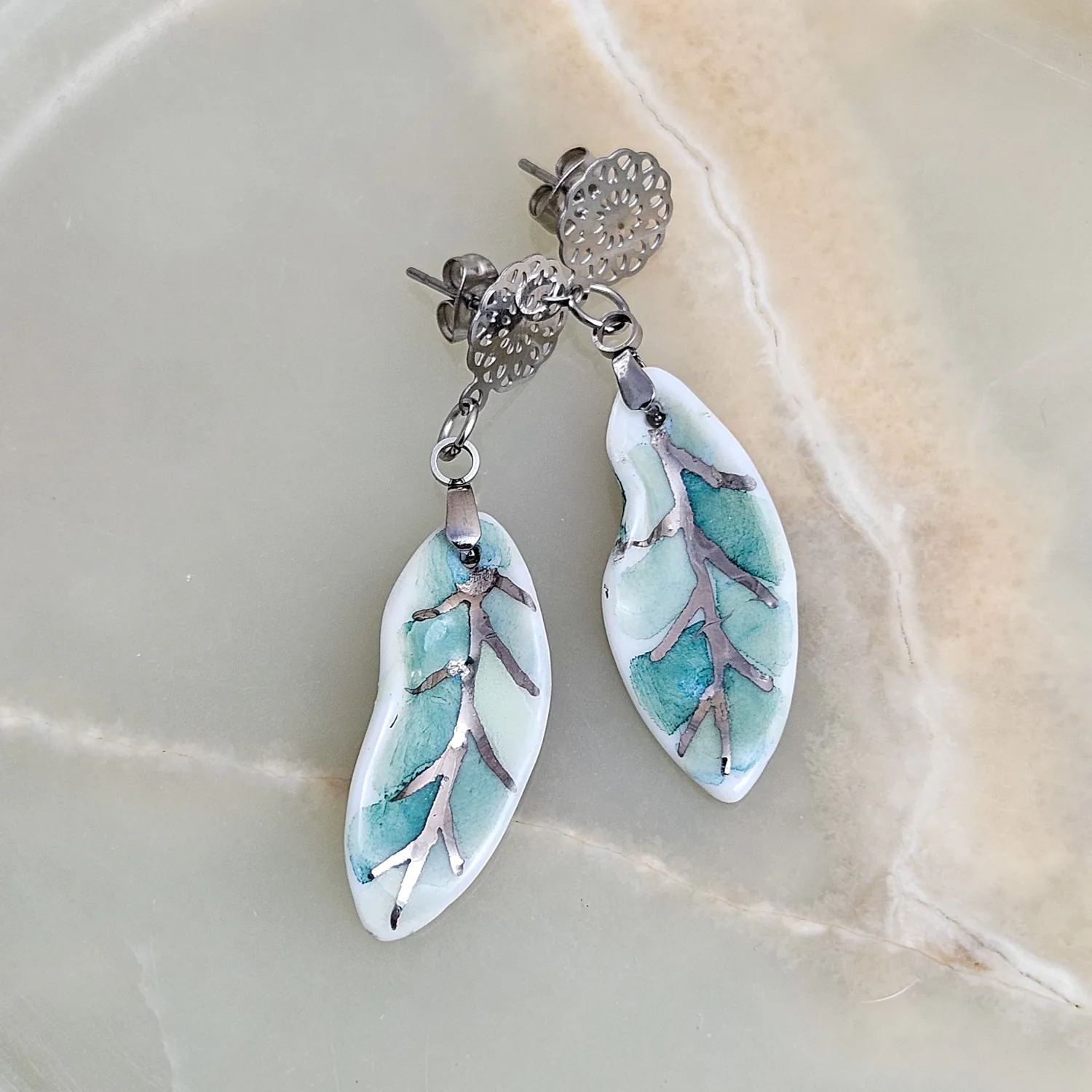 Dangle fine ceramic porcelain designer earrings - green leaf with silver accents (white gold)