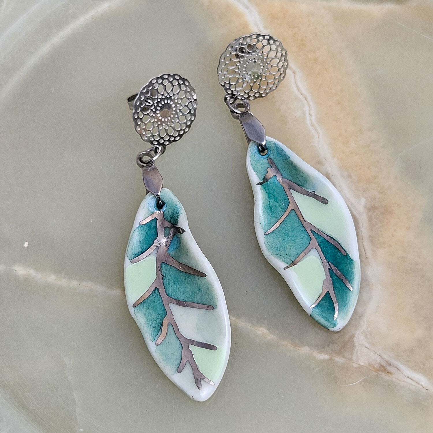 Dangle fine ceramic porcelain designer earrings - green leaf with silver accents (white gold)