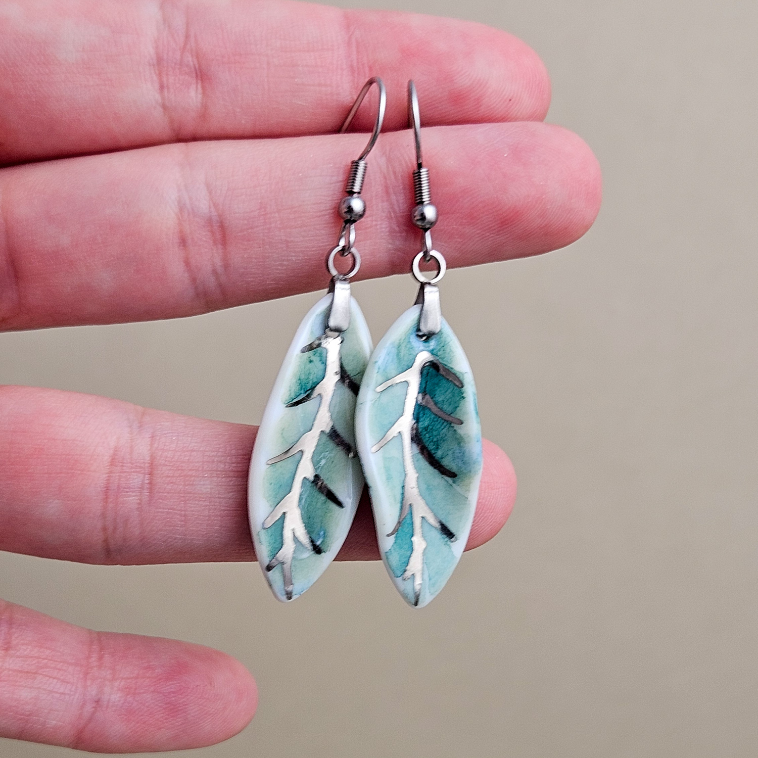 Dangle fine ceramic porcelain designer earrings - green leaf with silver accents (white gold) - Image 4
