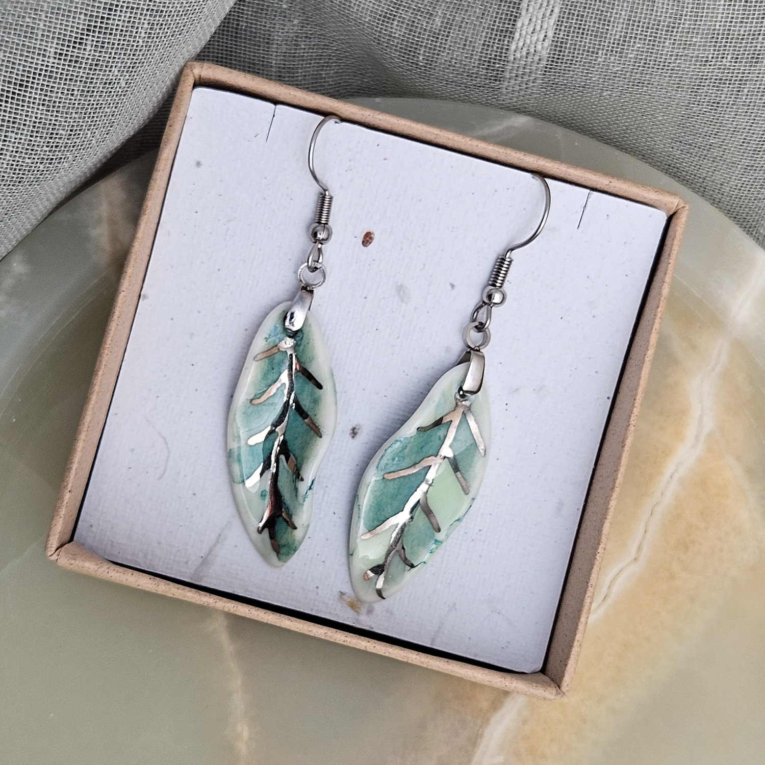 Dangle fine ceramic porcelain designer earrings - green leaf with silver accents (white gold) - Image 5