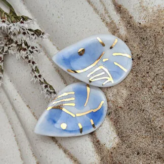 Blue porcelain stud earrings - handpainted shrimps with gold