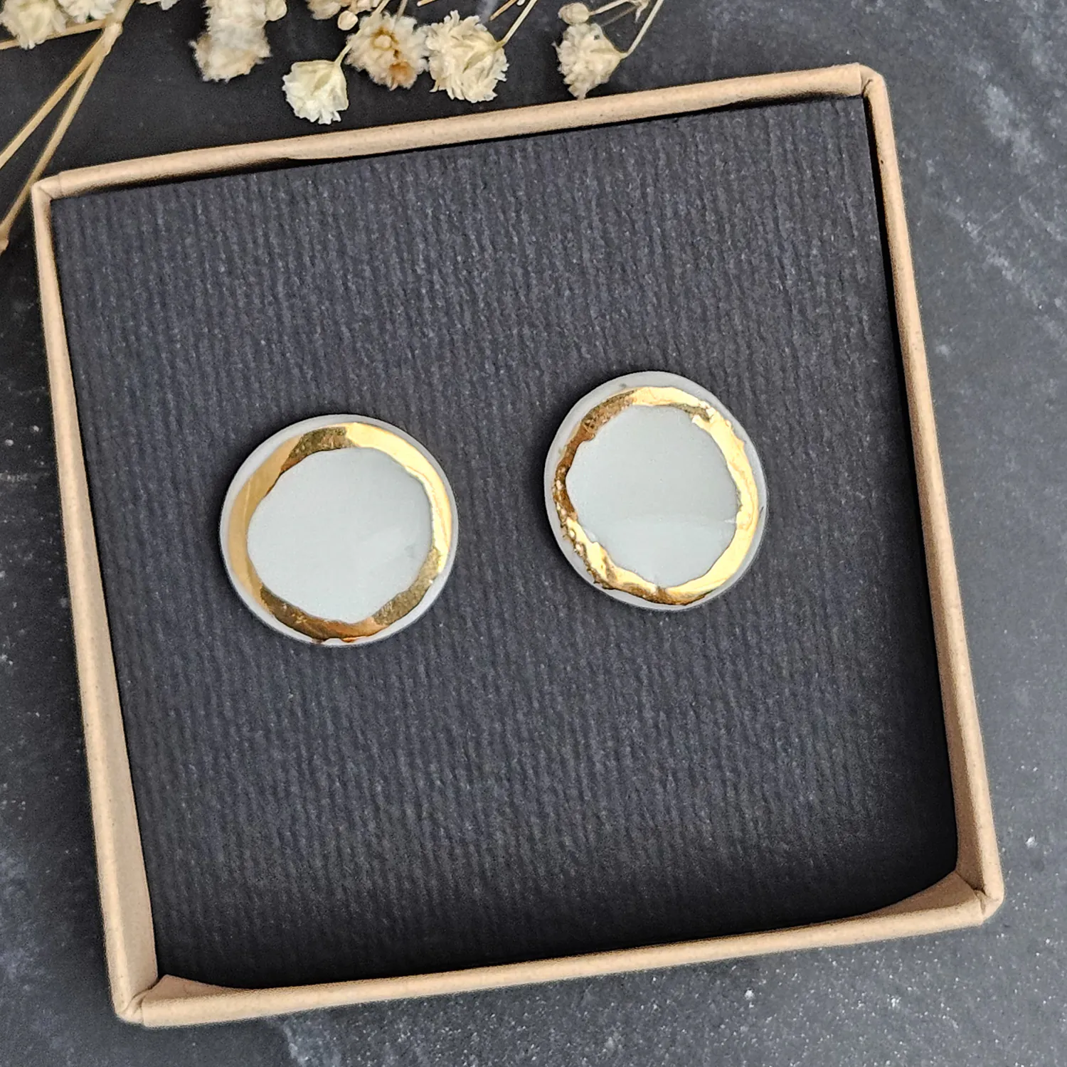 Pure white fine ceramic porcelain hypoallergenic stud designer earrings for sensitive ears with 22k gold plating - Image 2