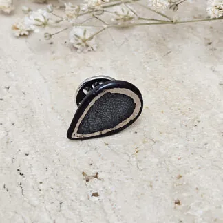 Black fine ceramic porcelain pin with silver accents (white gold)