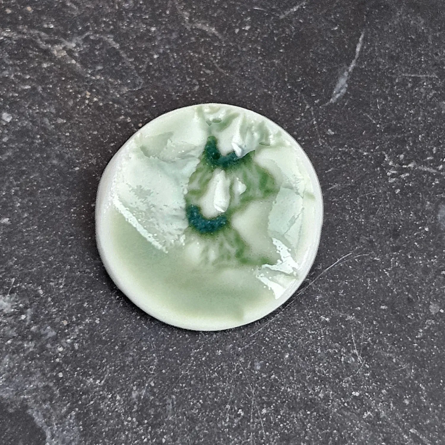 Green ceramic brooch pin - embossed crocheted pattern