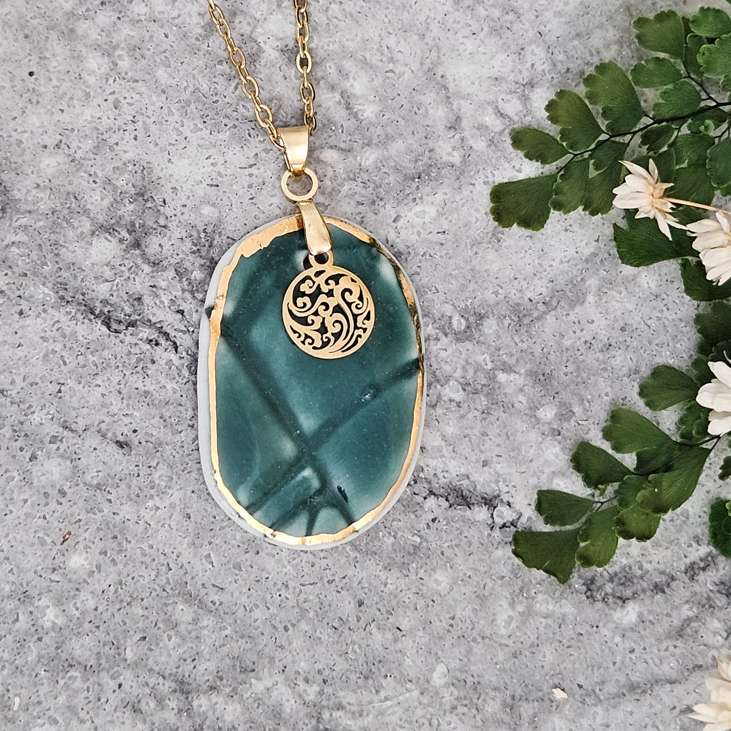 Emerald green fine ceramic porcelain designer necklace - embossed plant with 22k gold plating and round pendant with wavy patten