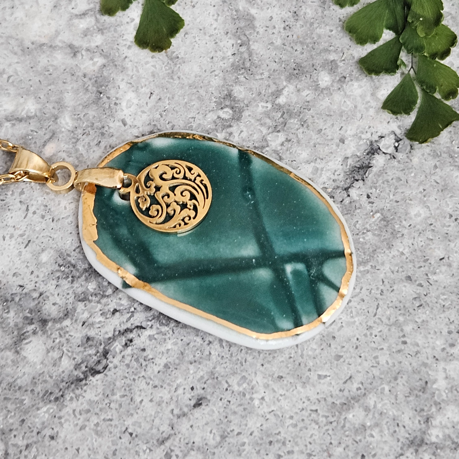 Emerald green fine ceramic porcelain designer necklace - embossed plant with 22k gold plating and round pendant with wavy patten - Image 2