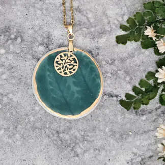 Emerald green fine ceramic porcelain designer necklace - embossed plant with 22k gold plating and round pendant with leaf pattern