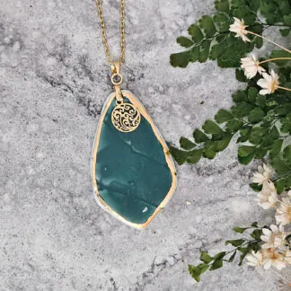 Emerald green fine ceramic porcelain designer necklace - embossed plant with 22k gold plating and round pendant with smoke pattern