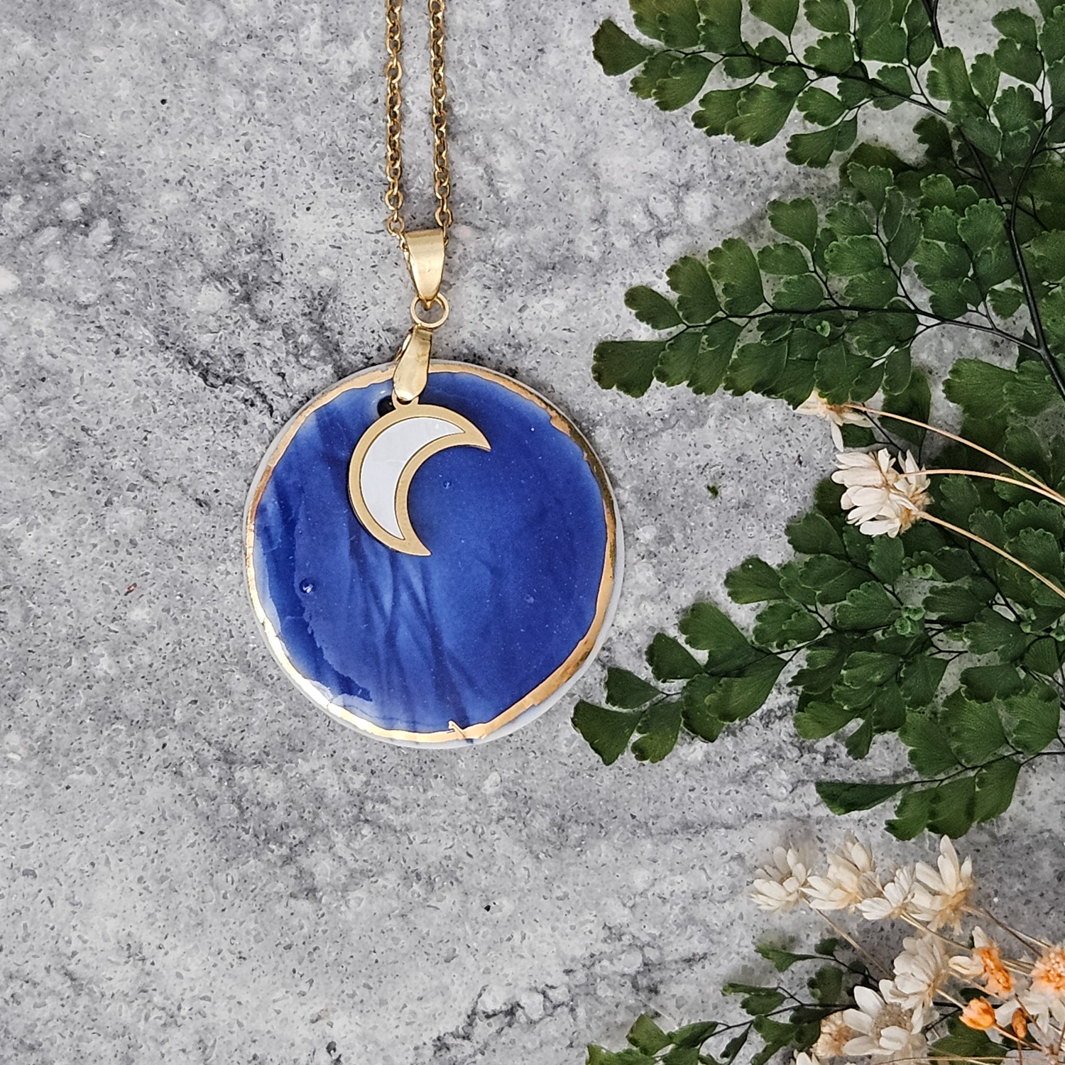 Cobalt blue fine ceramic porcelain designer necklace - embossed plant with 22k gold plating and moon pendant